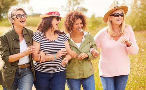 Women outdoors with confidence after falls risk medicines review by pharmacist.